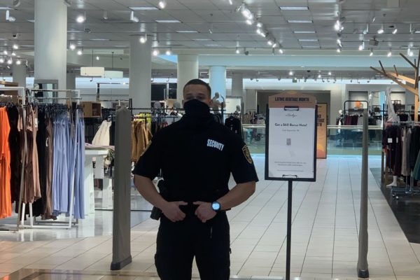 shopping center security guard inside a retail store at a strip mall in Los Angeles